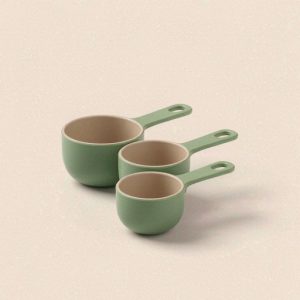 Illustration of a nesting set of three measuring cups with blank handles